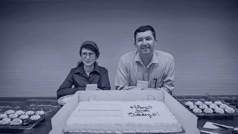 Sara Frug and Craig Newton with birthday cake